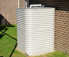 Square Steel Tank At Side Of House